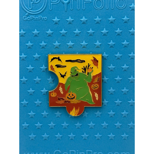 Disney The Nightmare Before Christmas Fall Characters Puzzle - Oogie Boogie On a blue background pin board from pins and wishes