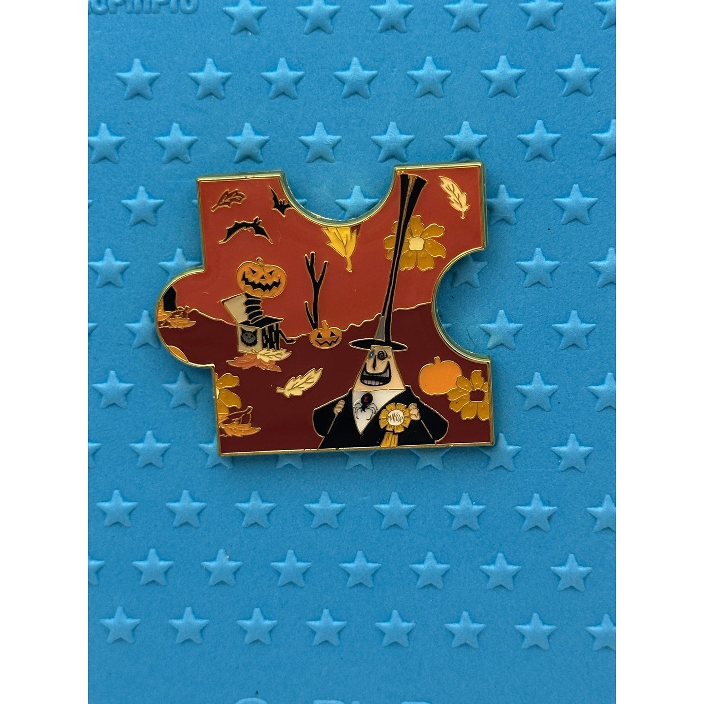 Disney The Nightmare Before Christmas Fall Characters Puzzle - The Mayor On a blue background pin board from pins and wishes