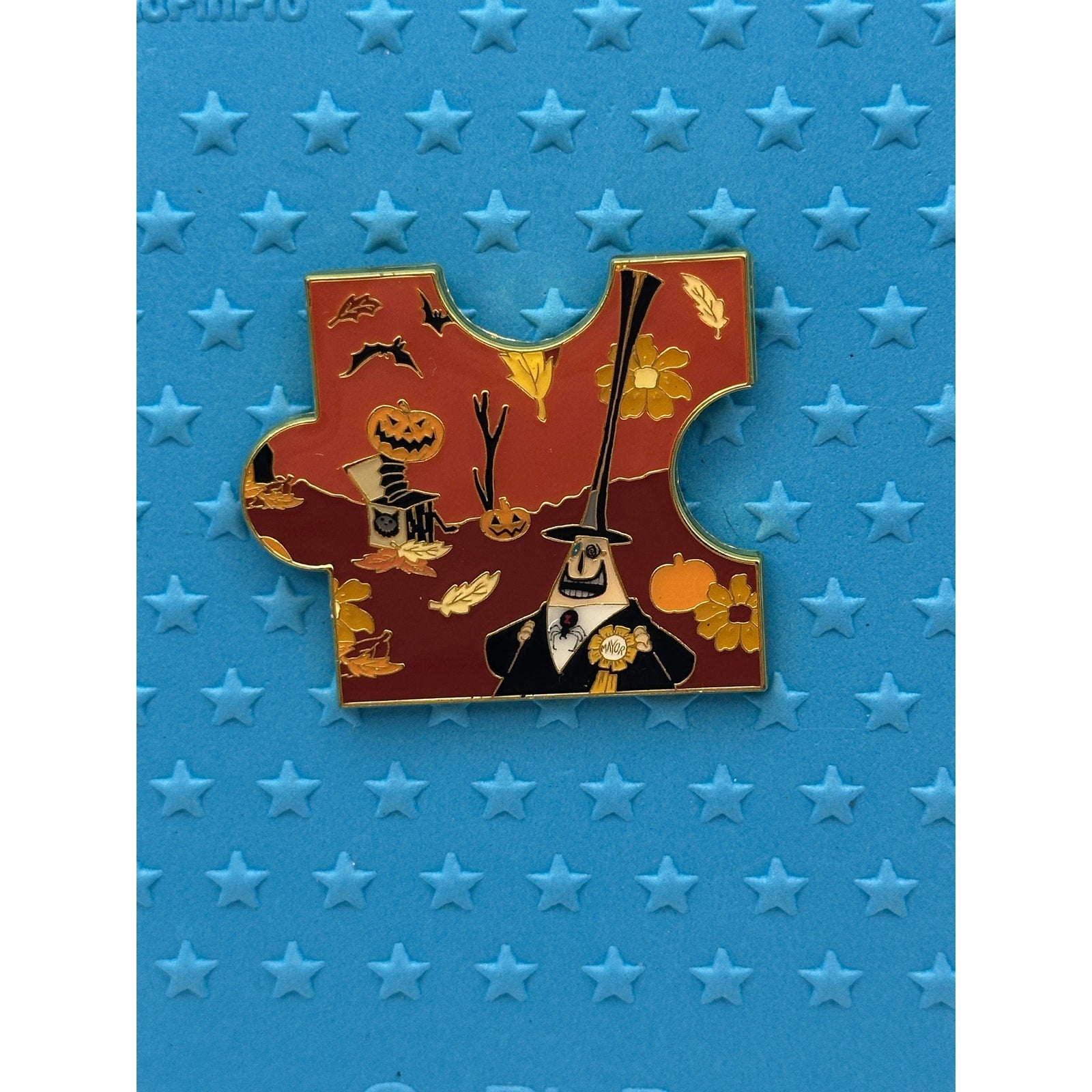 Disney The Nightmare Before Christmas Fall Characters Puzzle - The Mayor On a blue background pin board from pins and wishes