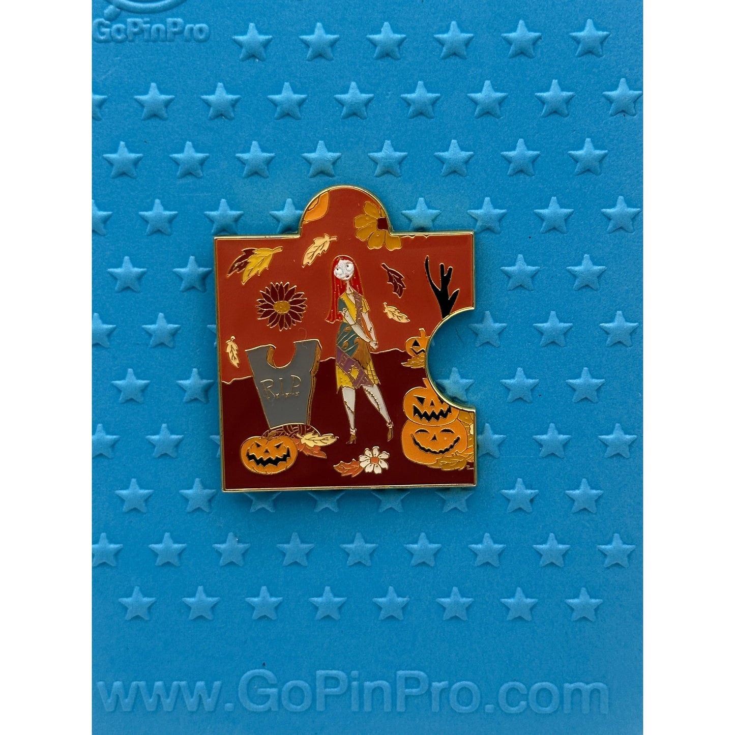 Loungefly Disney The Nightmare Before Christmas Fall Characters Puzzle - Sally on a blue Background pin board from pins and Wishes