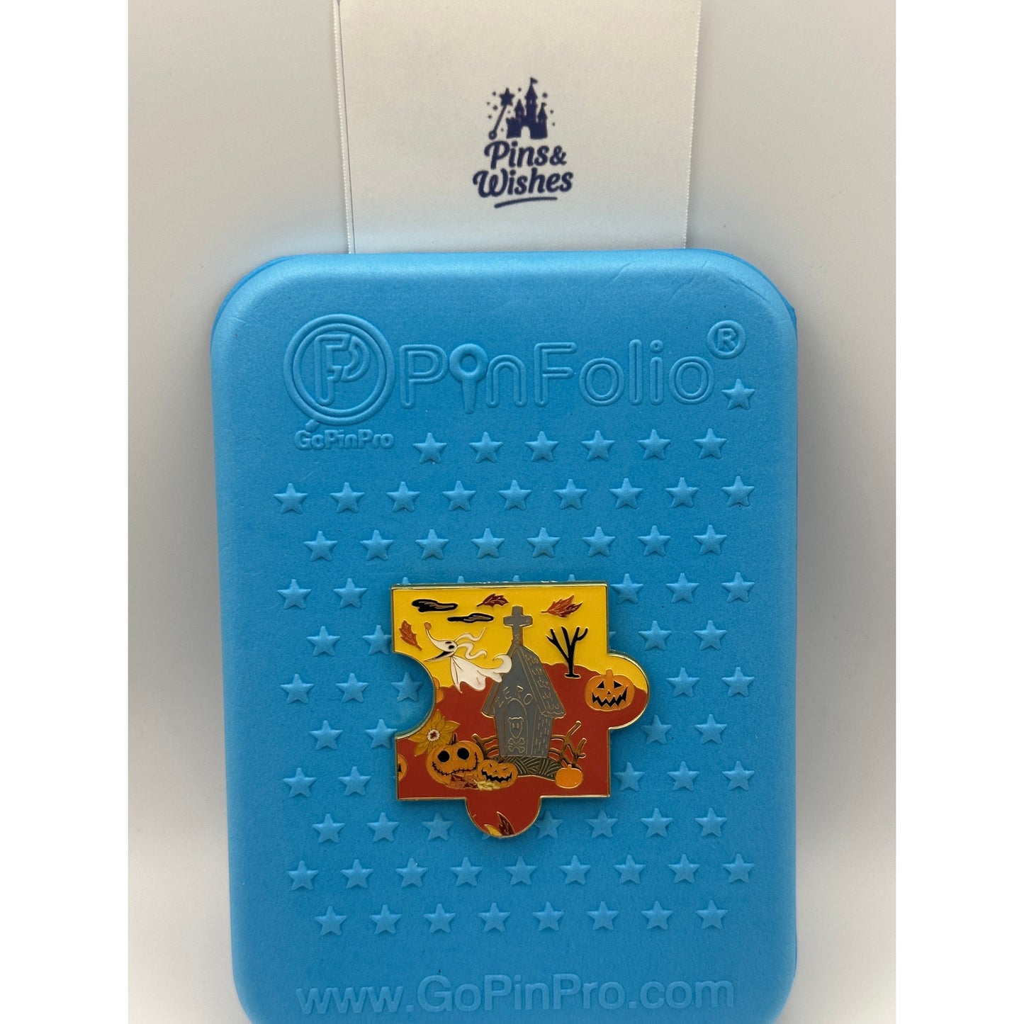 Loungefly Disney The Nightmare Before Christmas Fall Characters Puzzle - Zero pin on a Blue Background Pin Board with the Pins and Wishes Logo 