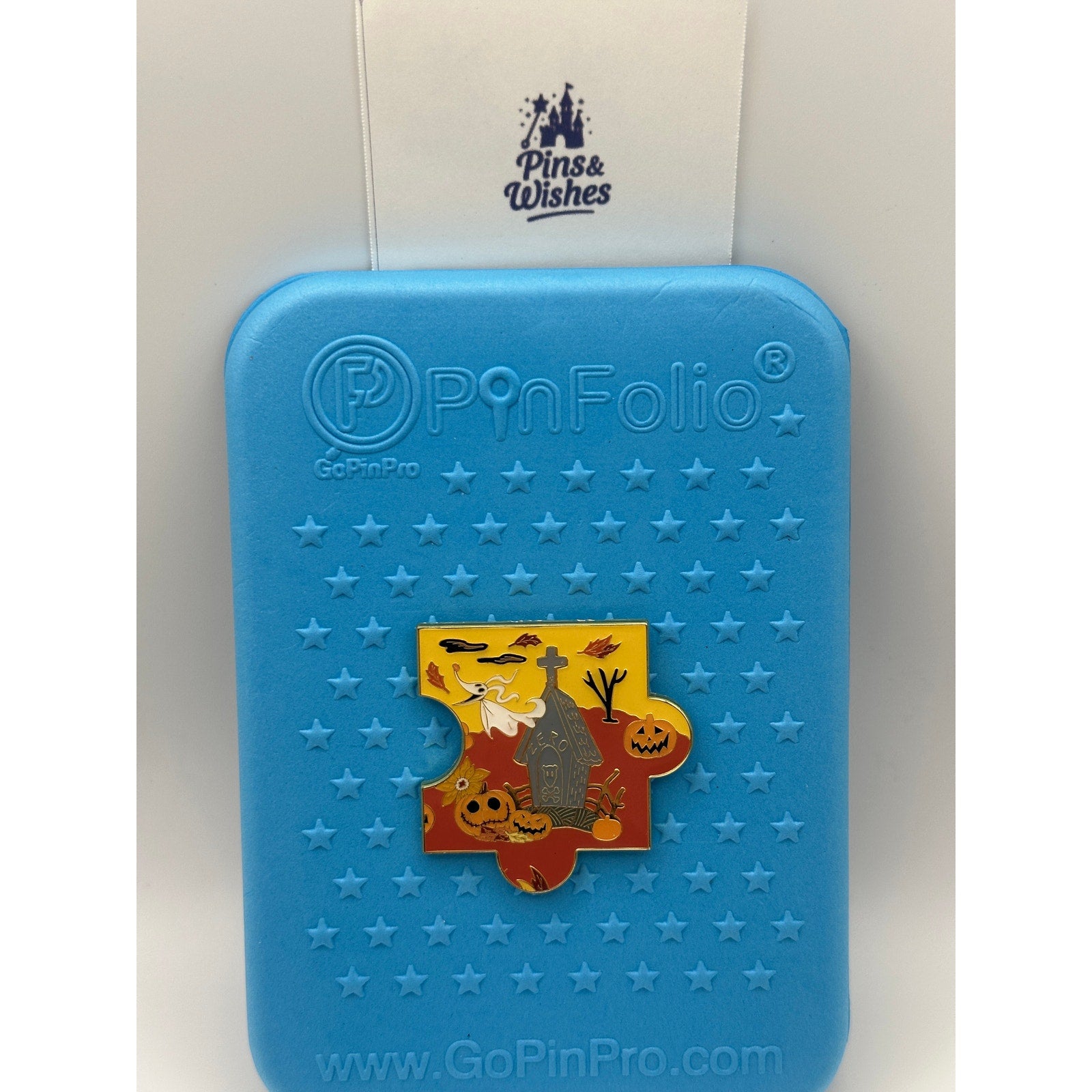 Loungefly Disney The Nightmare Before Christmas Fall Characters Puzzle - Zero pin on a Blue Background Pin Board with the Pins and Wishes Logo 